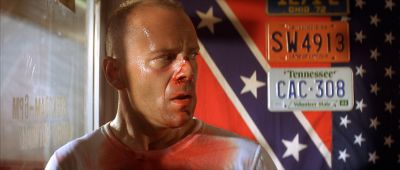 Still from Pulp Fiction (1994) that has been tagged with: medium close-up & flag