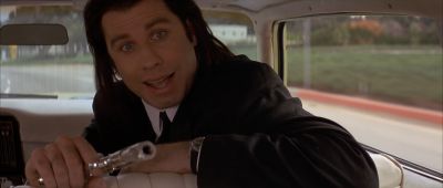 Still from Pulp Fiction (1994) that has been tagged with: day & gun & medium close-up