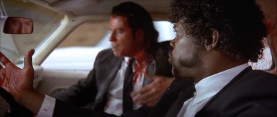 Still from Pulp Fiction (1994) that has been tagged with: blood & over-the-shoulder & medium close-up
