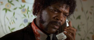 Still from Pulp Fiction (1994) that has been tagged with: cc6666 & close-up & phone