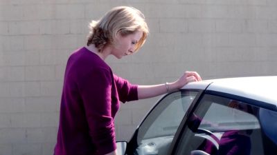 Still from Punch-Drunk Love (1999) that has been tagged with: day & medium wide & parking lot