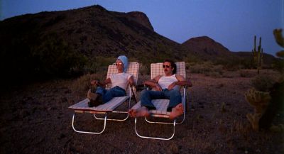 Still from Raising Arizona (1987) that has been tagged with: 305050 & two-shot & day & wide shot