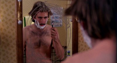 Still from Raising Arizona (1987) that has been tagged with: a67a59 & shaving & clean single & night