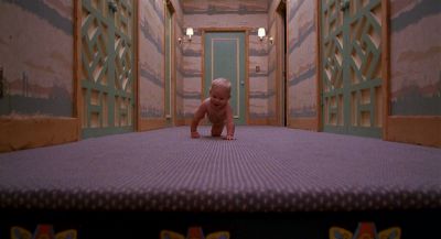 Still from Raising Arizona (1987) that has been tagged with: hallway & day & interior & clean single & wide shot