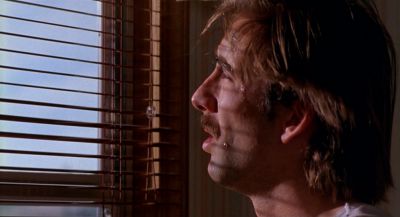 Still from Raising Arizona (1987) that has been tagged with: close-up & peeking