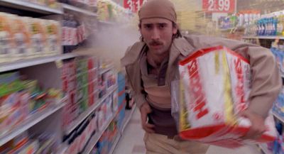 Still from Raising Arizona (1987) that has been tagged with: night & grocery store