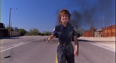 Still from Raising Arizona (1987) that has been tagged with: medium wide & smoke & car crash