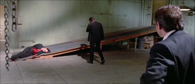 Still from Reservoir Dogs (1992) that has been tagged with: a67a59 & wide shot & interior & blood