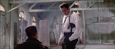 Still from Reservoir Dogs (1992) that has been tagged with: two-shot & over-the-shoulder & interior & wide shot