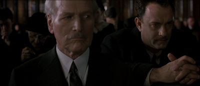 Still from Road To Perdition (2002) that has been tagged with: two-shot & group-shot & interior & medium close-up