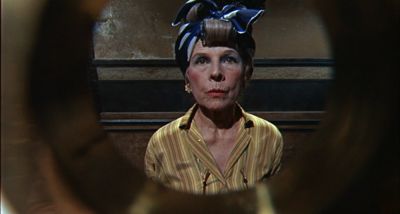 Still from Rosemary's Baby (1968) that has been tagged with: day & peephole & frame in a frame