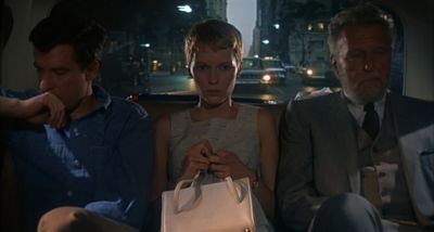 Still from Rosemary's Baby (1968) that has been tagged with: car interior & interior & car & medium wide & three-shot