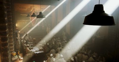 Still from RRR (2022) that has been tagged with: high-angle & god rays