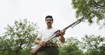 Still from RRR (2022) that has been tagged with: forest & woods & clean single & gun