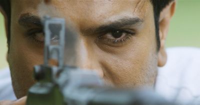 Still from RRR (2022) that has been tagged with: scope & gun
