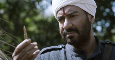 Still from RRR (2022) that has been tagged with: 1a2321 & medium close-up & exterior