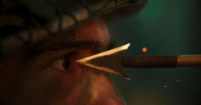 Still from RRR (2022) that has been tagged with: extreme close-up & eyes & exterior