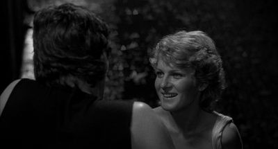 Still from Rumble Fish (1983) that has been tagged with: over-the-shoulder & day & black and white