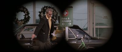 Still from Rushmore (1998) that has been tagged with: day & binocular pov & car