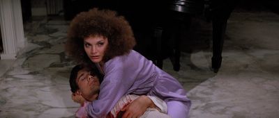 Still from Scarface (1983) that has been tagged with: dead body & hug