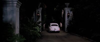 Still from Scarface (1983) that has been tagged with: establishing shot & car