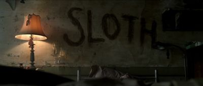 Still from Se7en (1995) that has been tagged with: handwriting & bed