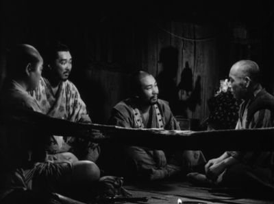 Still from Seven Samurai (1954) that has been tagged with: bfbfbf & medium wide & black and white & group-shot & night