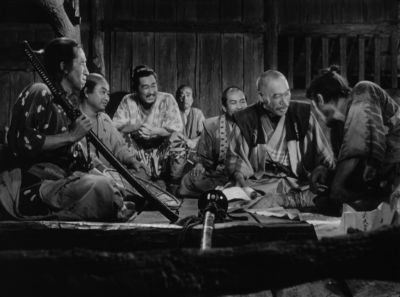 Still from Seven Samurai (1954) that has been tagged with: bfbfbf & black and white & interior & wide shot & night