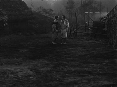 Still from Seven Samurai (1954) that has been tagged with: night & wide shot & black and white