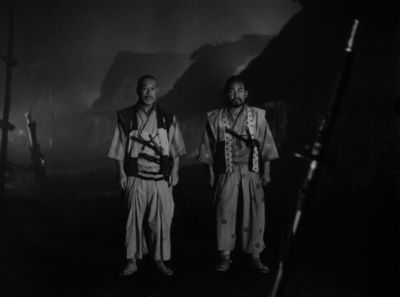 Still from Seven Samurai (1954) that has been tagged with: exterior & wide shot & night & black and white