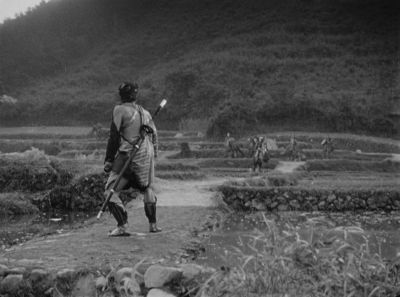 Still from Seven Samurai (1954) that has been tagged with: d4d4d4 & over-the-shoulder & black and white & wide shot