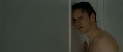 Still from Shame (2011) that has been tagged with: door & medium shot & night