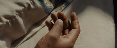 Still from Sicario (2015) that has been tagged with: bed & hand & insert & fingers