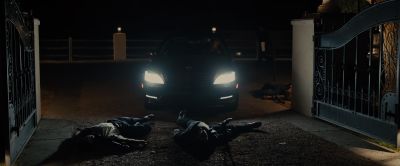 Still from Sicario (2015) that has been tagged with: night & headlight & car