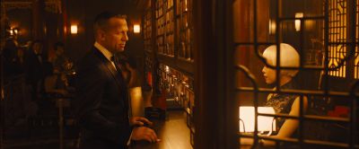 Still from Skyfall (2012) that has been tagged with: profile shot & counter & night