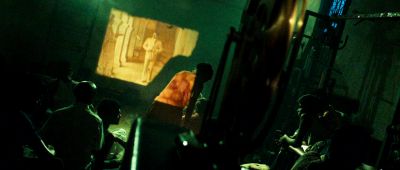 Still from Slumdog Millionaire (2008) that has been tagged with: movie theater