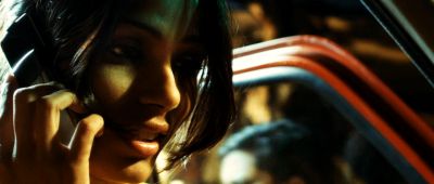 Still from Slumdog Millionaire (2008) that has been tagged with: phone