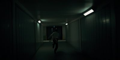 Still from TV Show: Netflix — "Stranger Things: Season 1 - Episode 1" that has been tagged with: 546973 & fluorescent light & running & hallway
