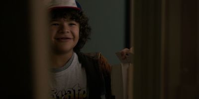 Still from TV Show: Netflix — "Stranger Things: Season 1 - Episode 1" that has been tagged with: doorway & interior & child