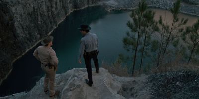 Still from TV Show: Netflix — "Stranger Things: Season 1 - Episode 2" that has been tagged with: day & lake & wide shot & high-angle