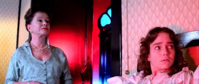 Still from Suspiria (1977) that has been tagged with: medium wide & night & two-shot