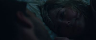 Still from Swallow (2019) that has been tagged with: over-the-shoulder & bed & night
