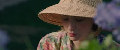 Still from Swallow (2019) that has been tagged with: hat & flower