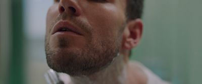 Still from Swallow (2019) that has been tagged with: bathroom & shaving