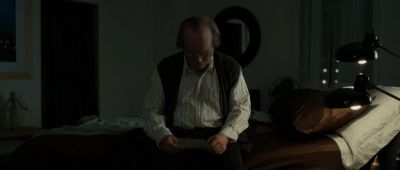 Still from Synecdoche, New York (2012) that has been tagged with: bed & medium shot & bedroom & night