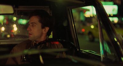 Still from Taxi Driver (1976) that has been tagged with: b4a541 & car interior & taxi & clean single