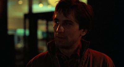 Still from Taxi Driver (1976) that has been tagged with: clean single & night & medium close-up & exterior