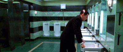 Still from The Aviator (2004) that has been tagged with: day & sink & wide shot & urinal & interior & public bathroom