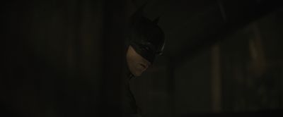 Still from The Batman (2022) that has been tagged with: medium close-up & mask & clean single