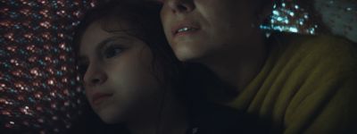 Still from Commercial: McDonald's — "The Bed" that has been tagged with: child & under blanket